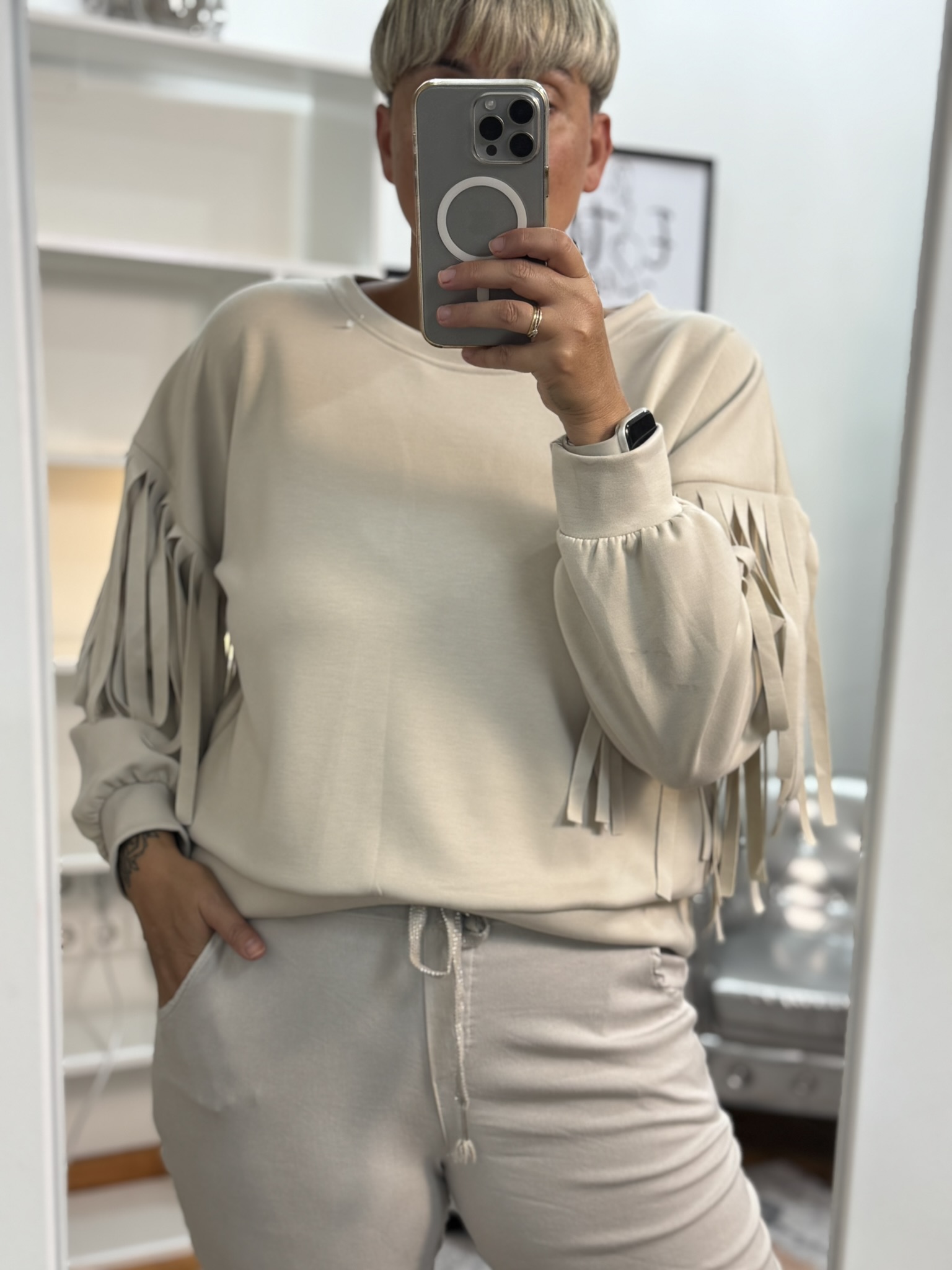Sudadera flecos