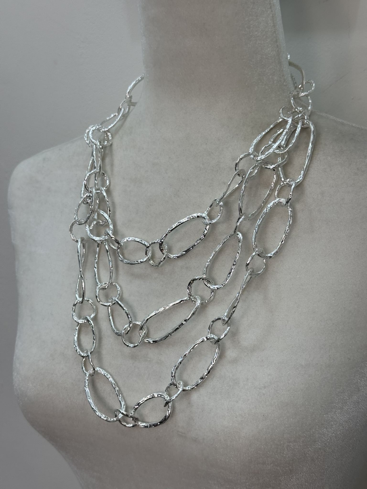 Collar triple eslabones
