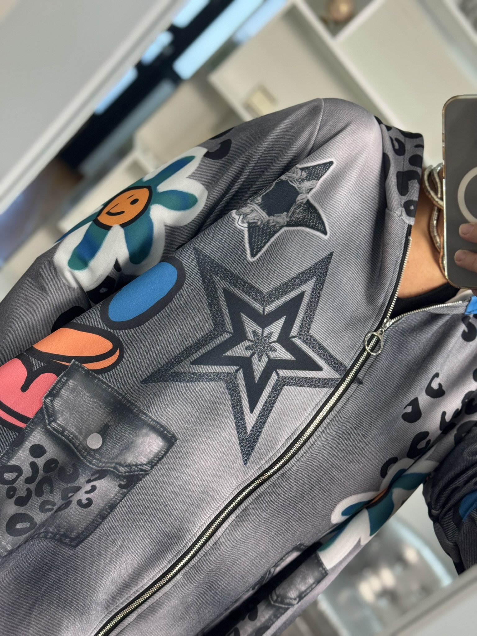Chaqueta estampada flor y estrella