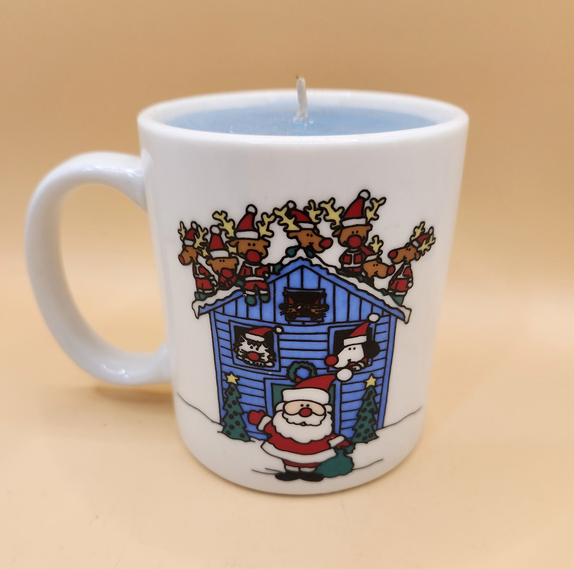 Christmas-themed mug candle