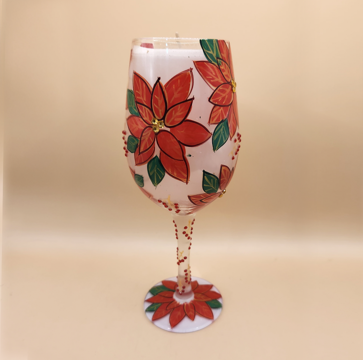 Hand-painted poinsettia wine glass