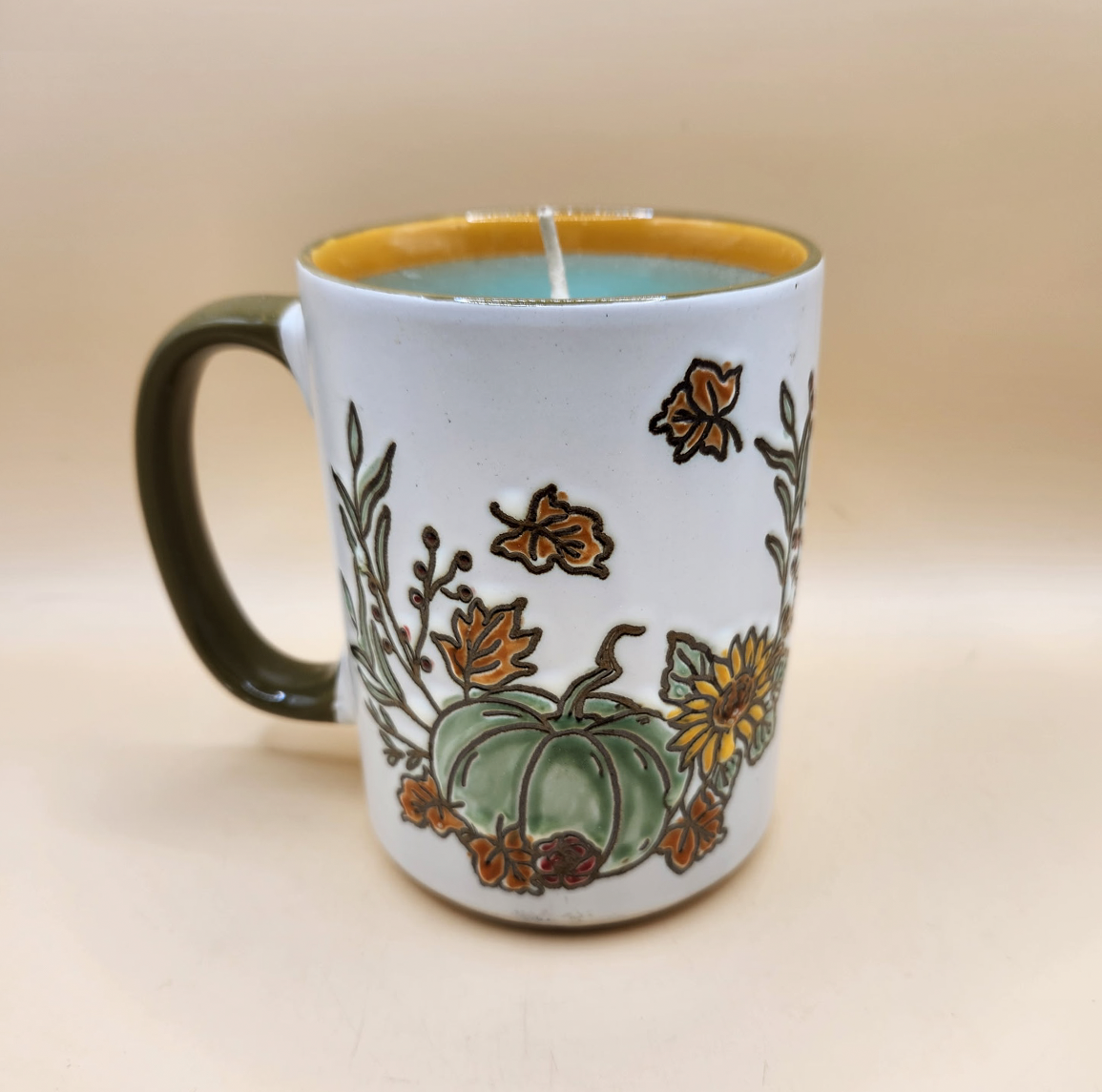 Ceramic autumn-themed mug candle