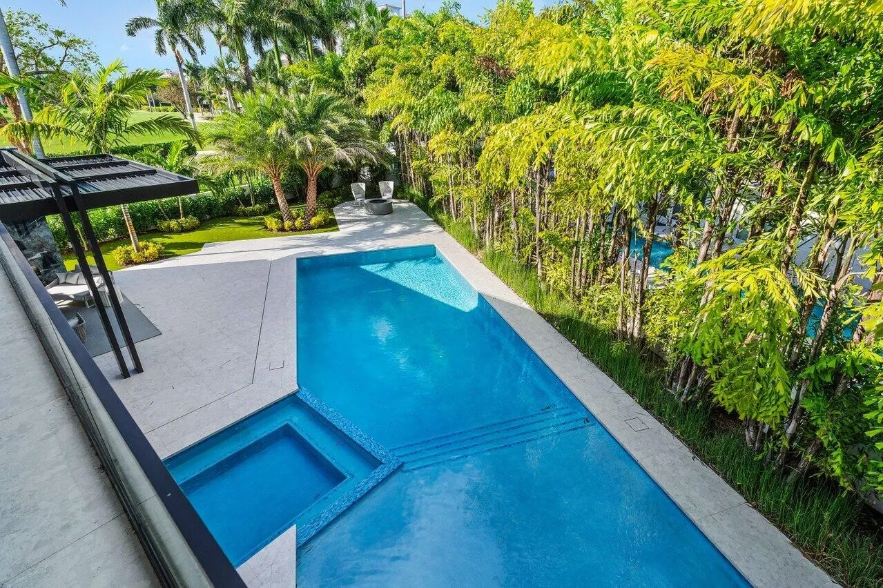 $18,500,000.00 | 6 bed 7.5+ bath 8,432sqft 8,432 square feet 0.37acre lot | 217 Thatch Palm Dr, Boca Raton, FL 33432.