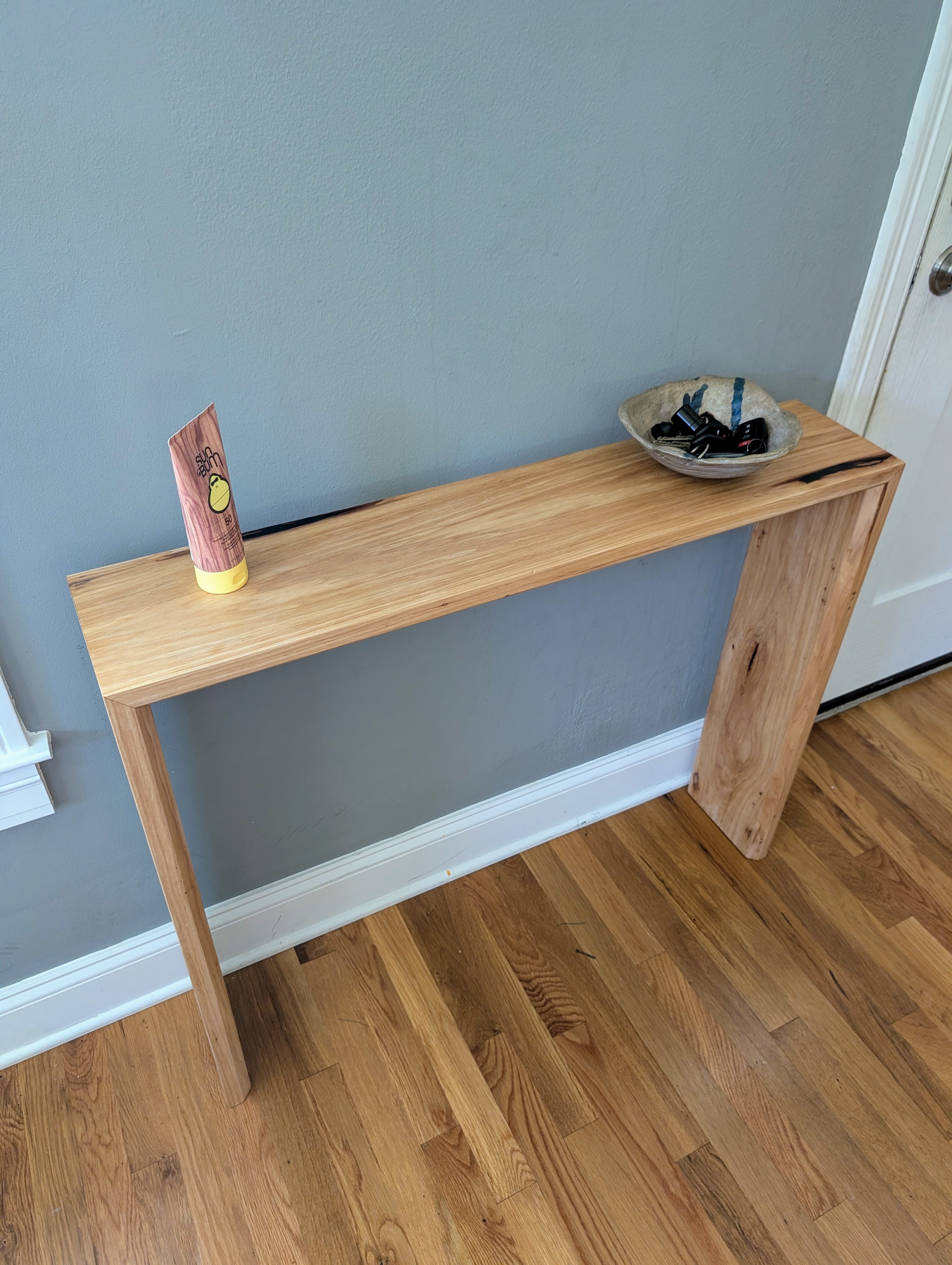 Waterfall Pecan Console Table with Black Epoxy Inlay