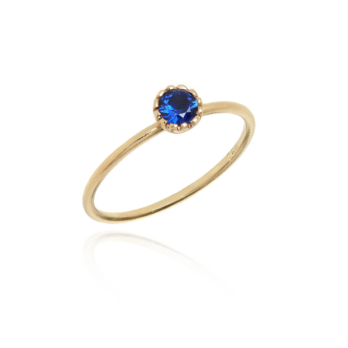 Gold Ring with Blue Sapphire. (Contact us for price)