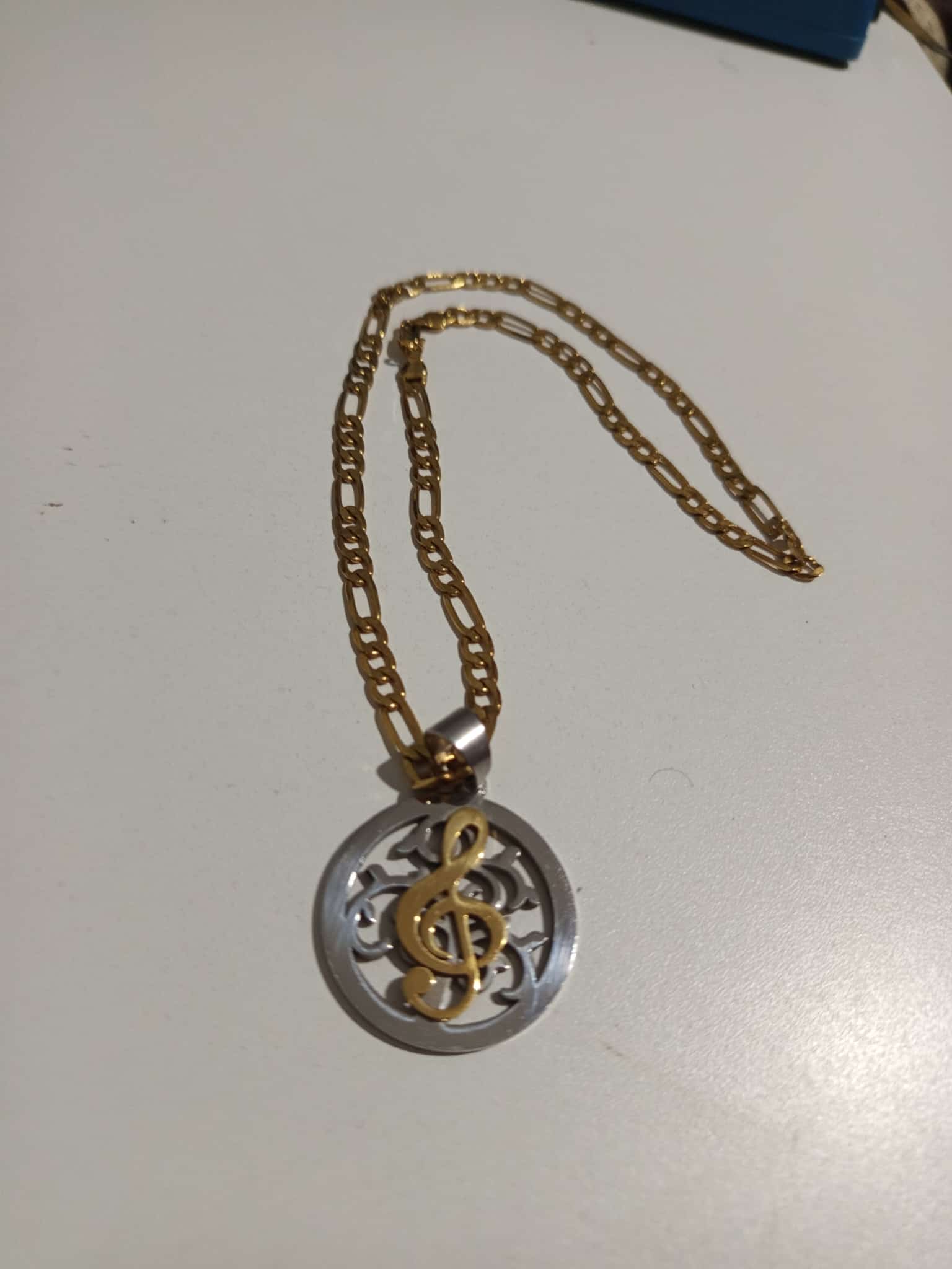 Collar inoxidable, clave de Sol