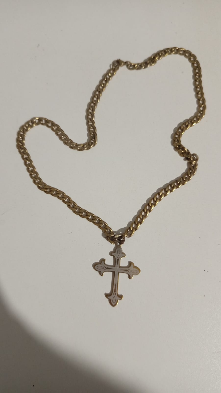 Cruz y collar inoxidables