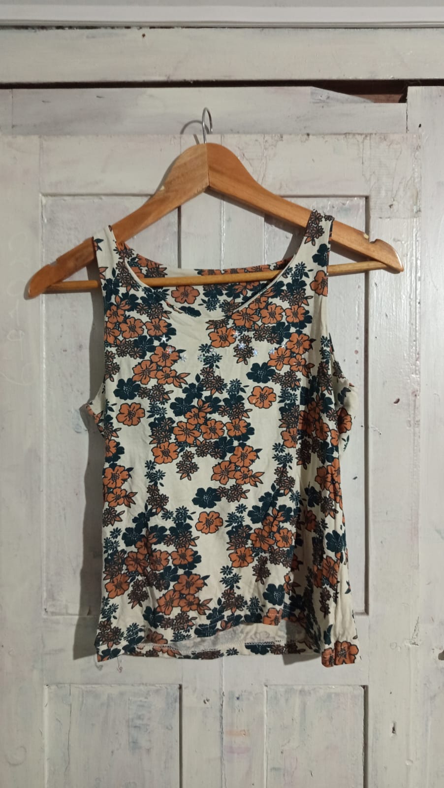 Blusa sin mangas con estampado de flores