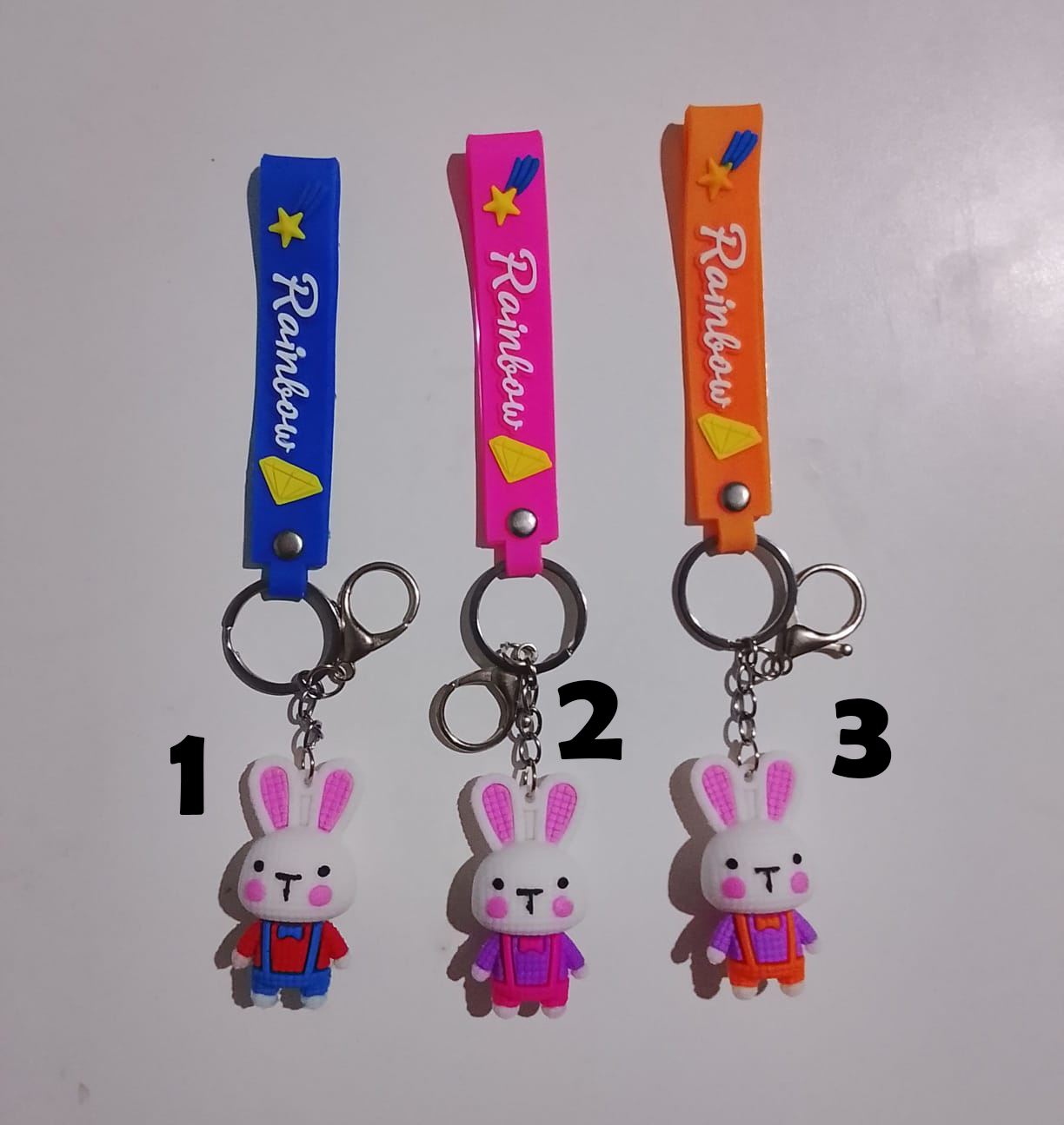 Conejitos elegantes, llaveros de goma, precio x unidad
