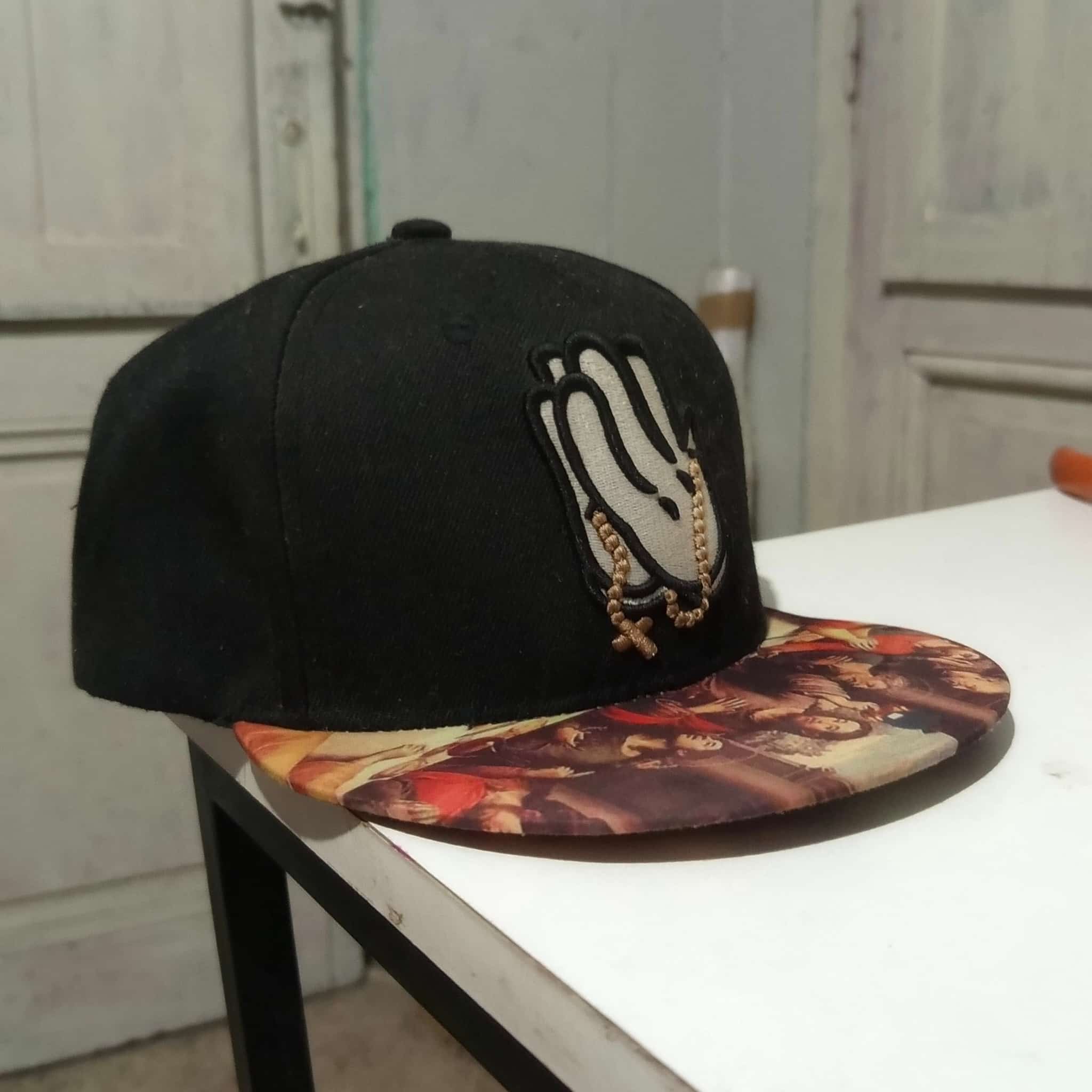 Gorra Negra, Oración