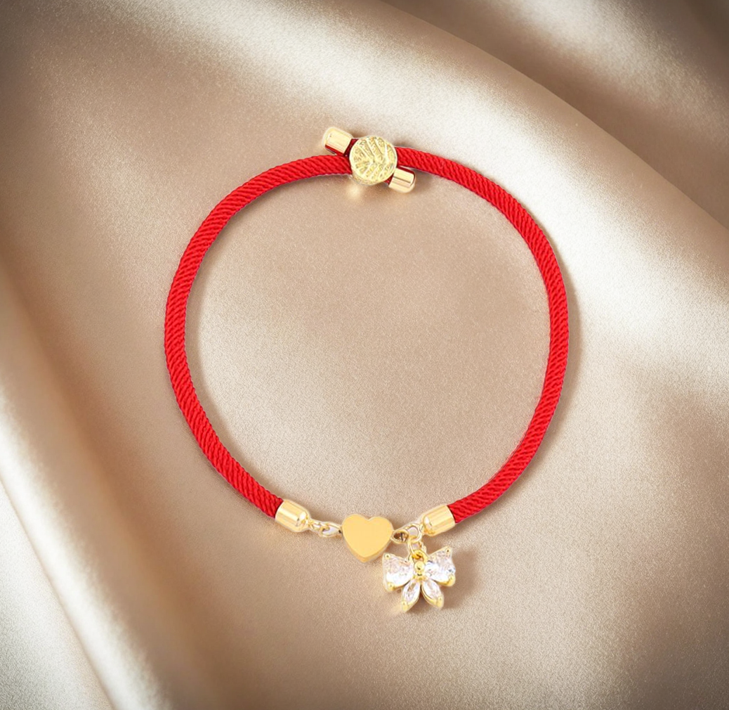 Bracelet nylon acier cœur et noeud strass