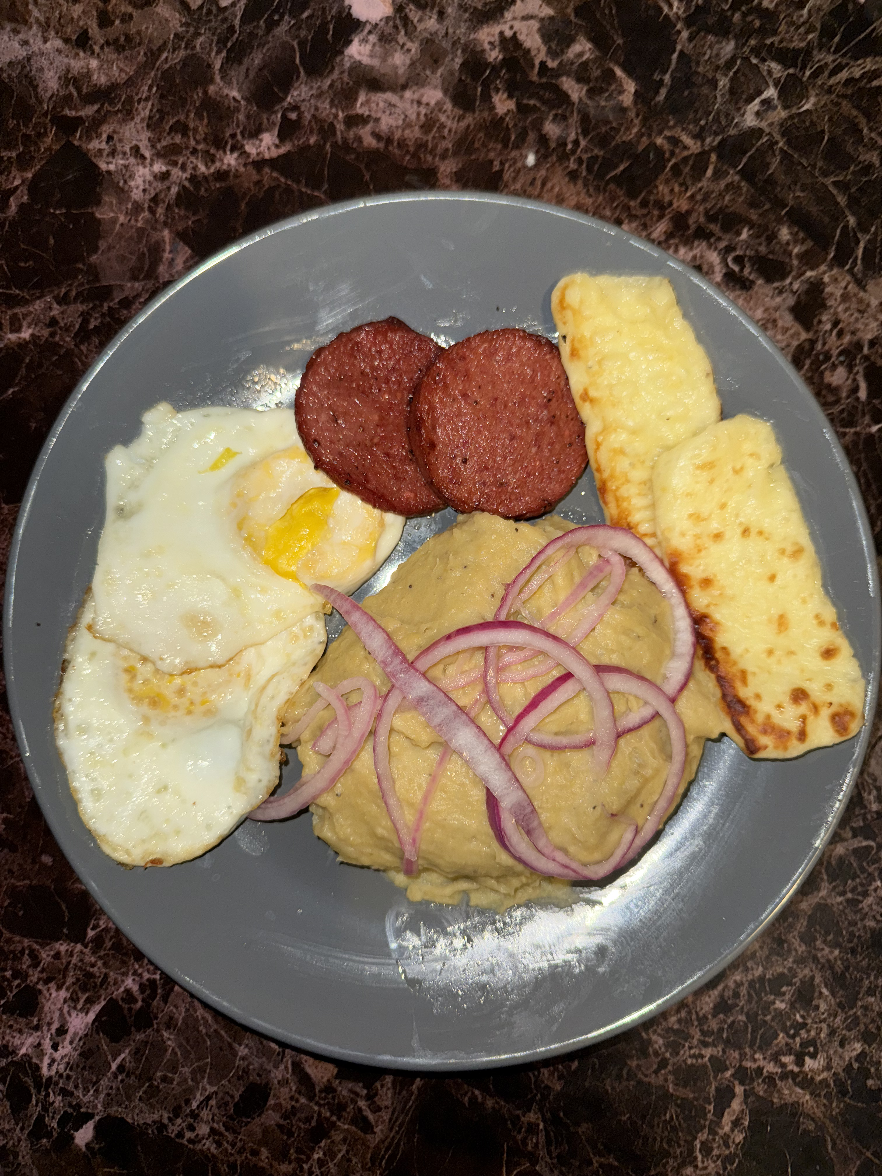 Mangu con los tres golpes