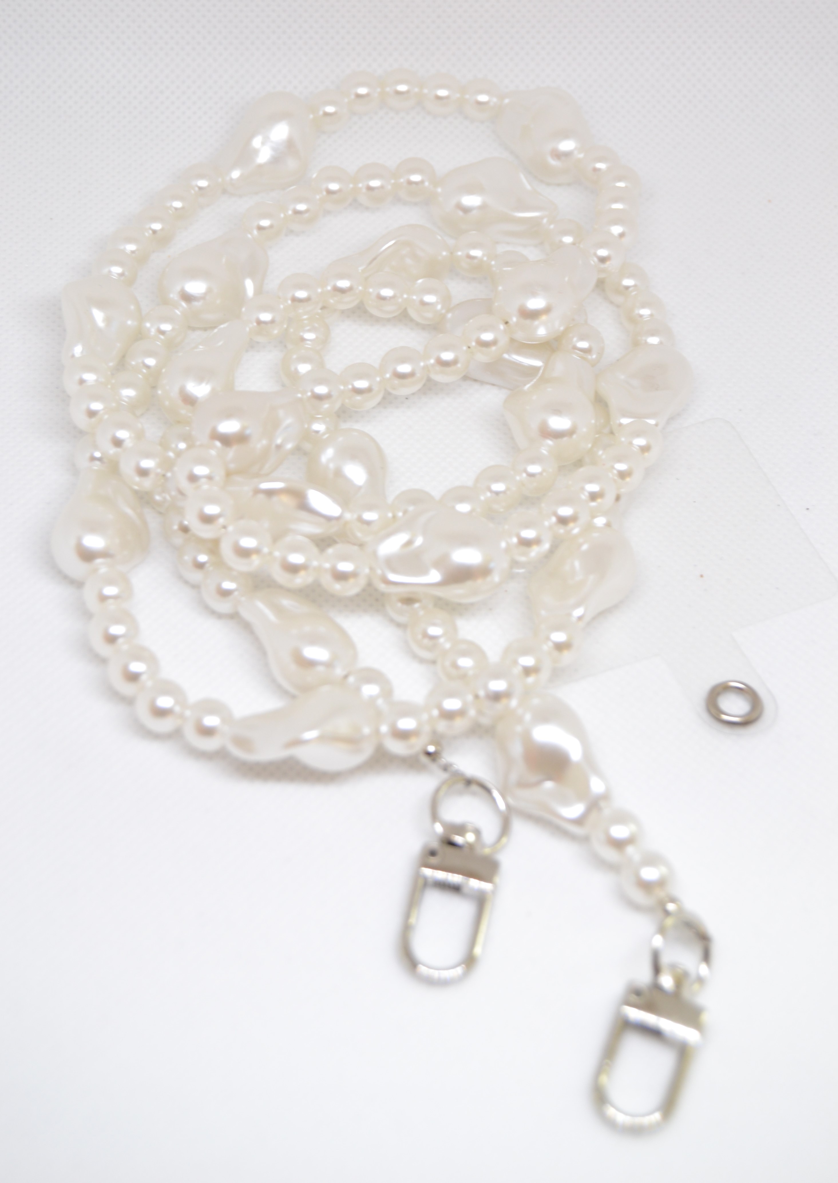 Žaismingi karoliai telefonui