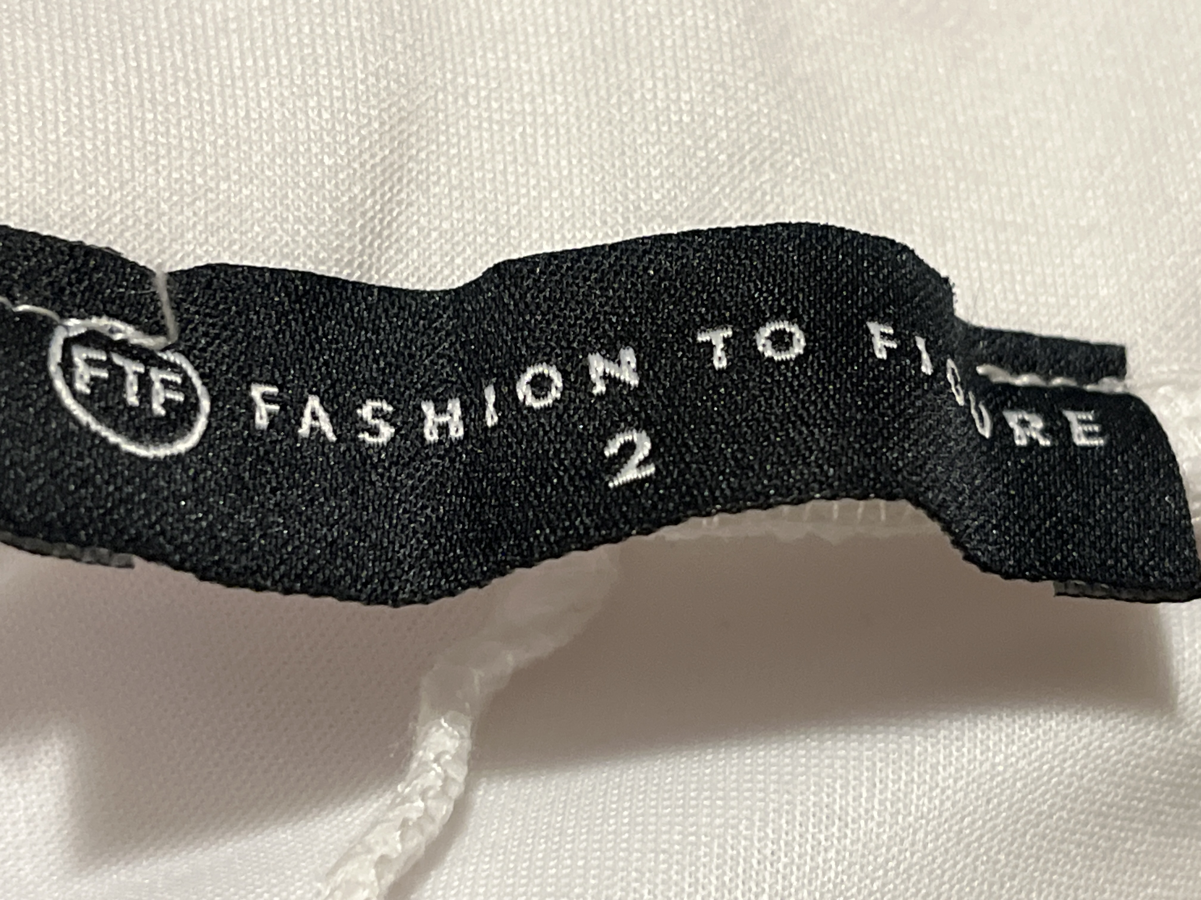 Fashion 2  Figure- White Flared and asymmetrical Skirt