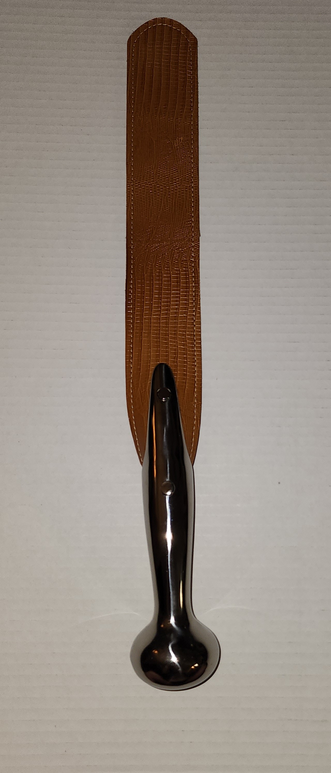 Light brown gator skin leather slapper with silver haim handle