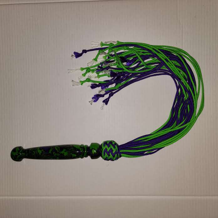 Purple and green acrylic handled flogger with purple and green paracord falls