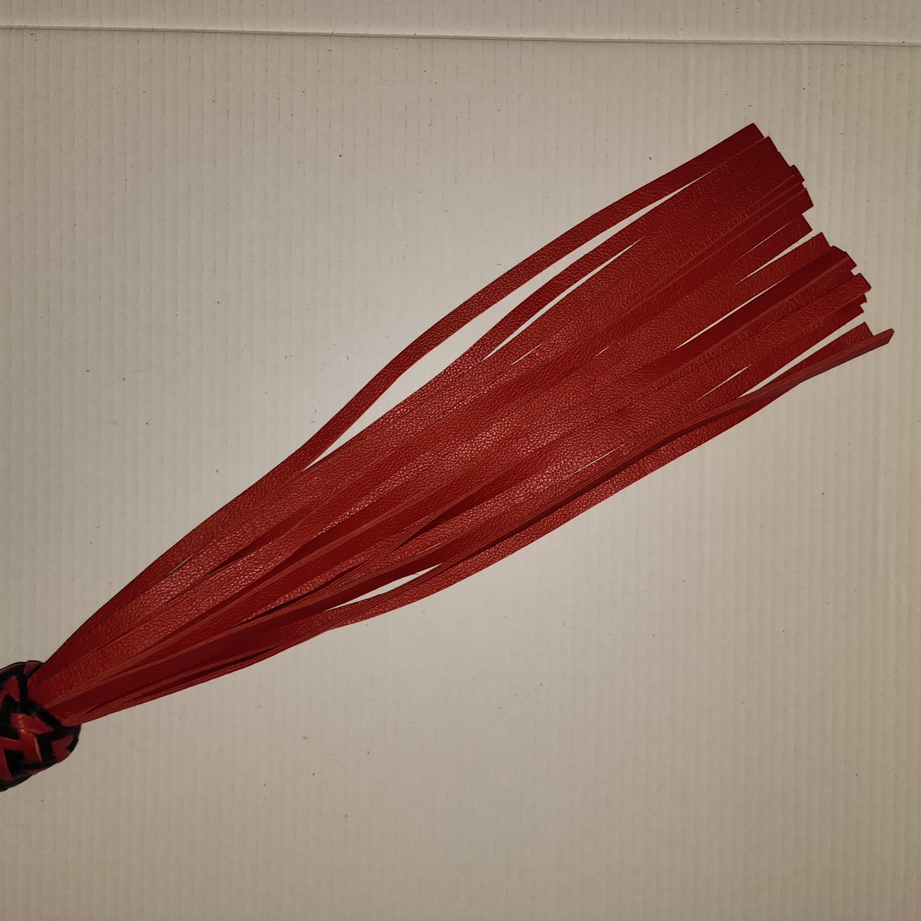 Aluminum motorcycle grip handled flogger braided with red and black leather and red motochap leather falls