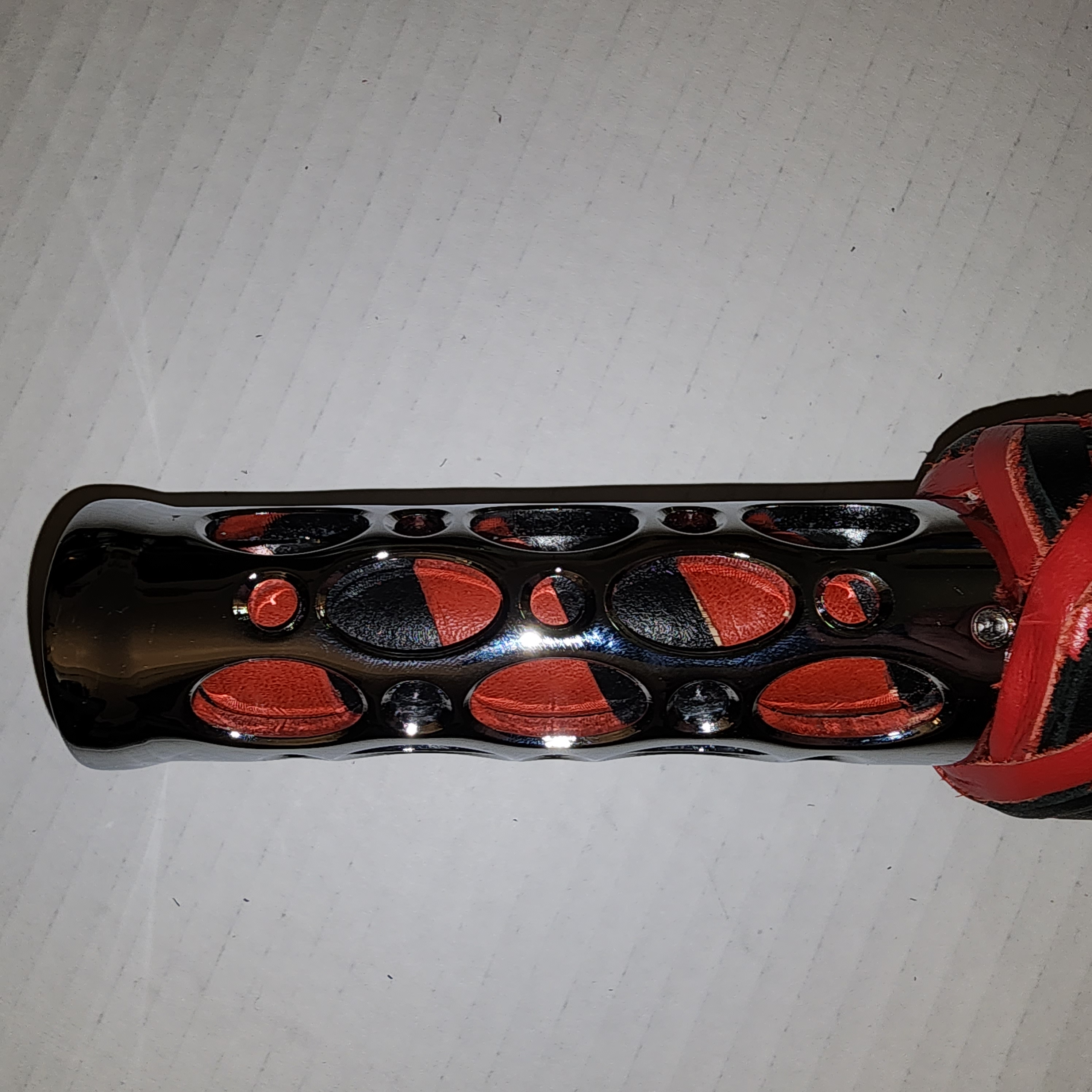 Aluminum motorcycle grip handled flogger braided with red and black leather and red motochap leather falls