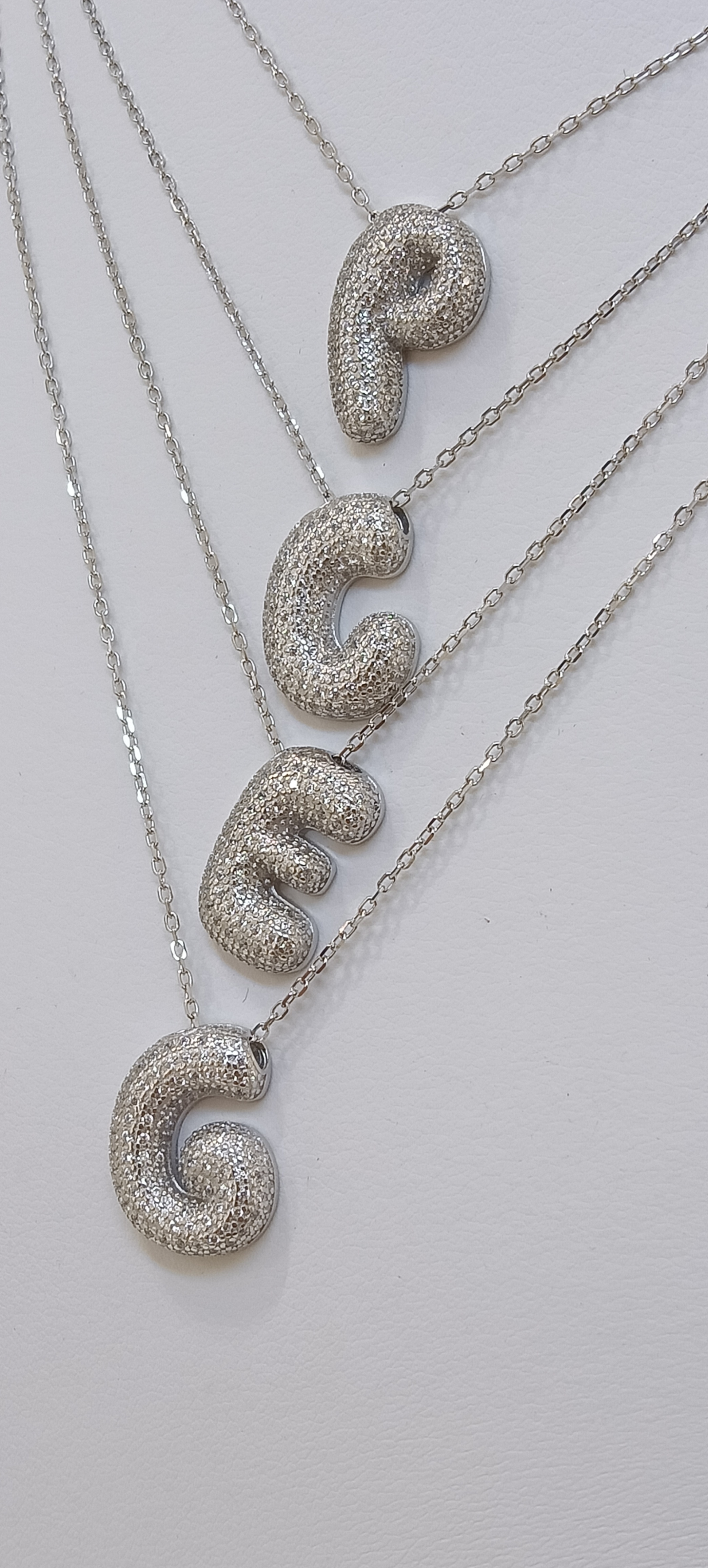 Collier iniziale pavè