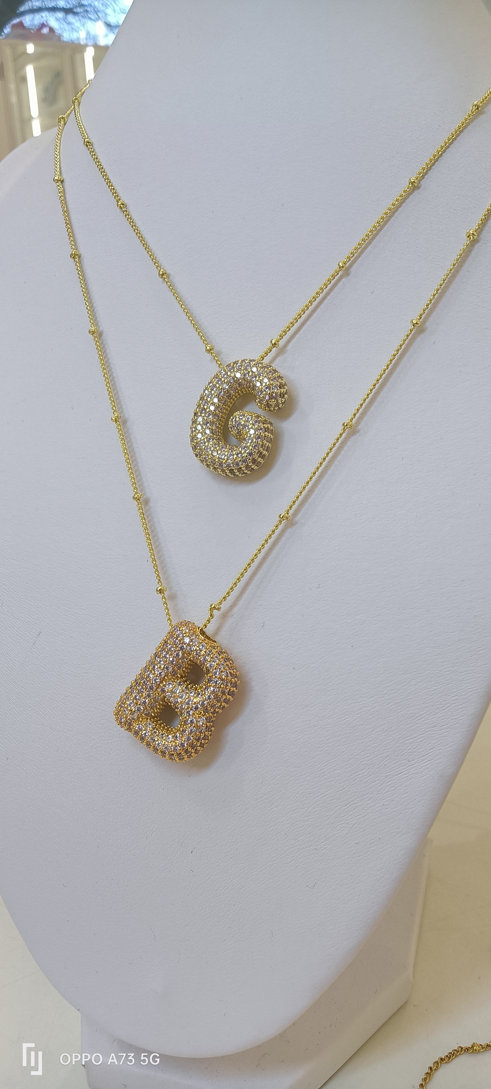 Collier iniziale pavè bigiotteria 