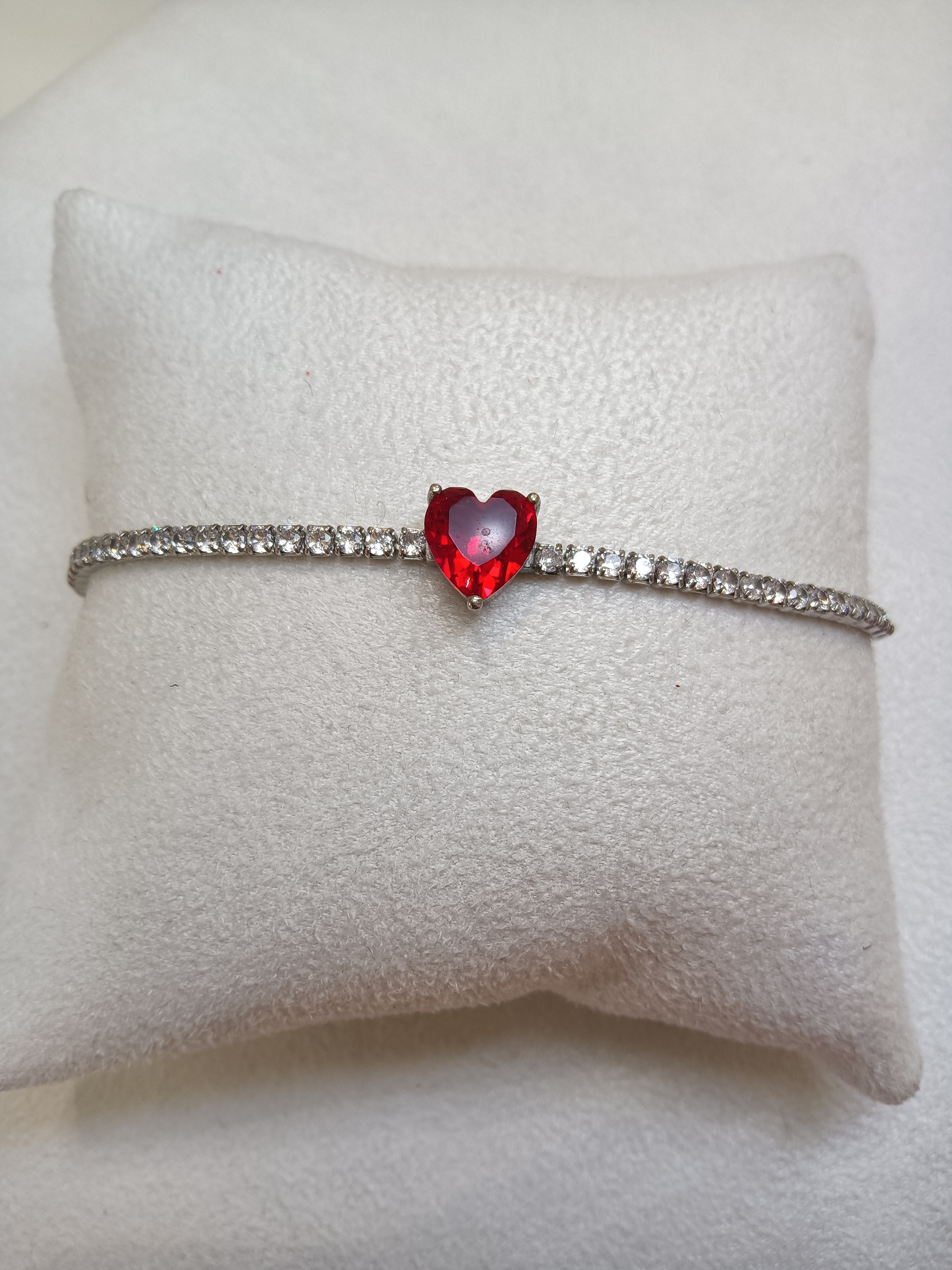 Bracciale tennis con cuore centrale