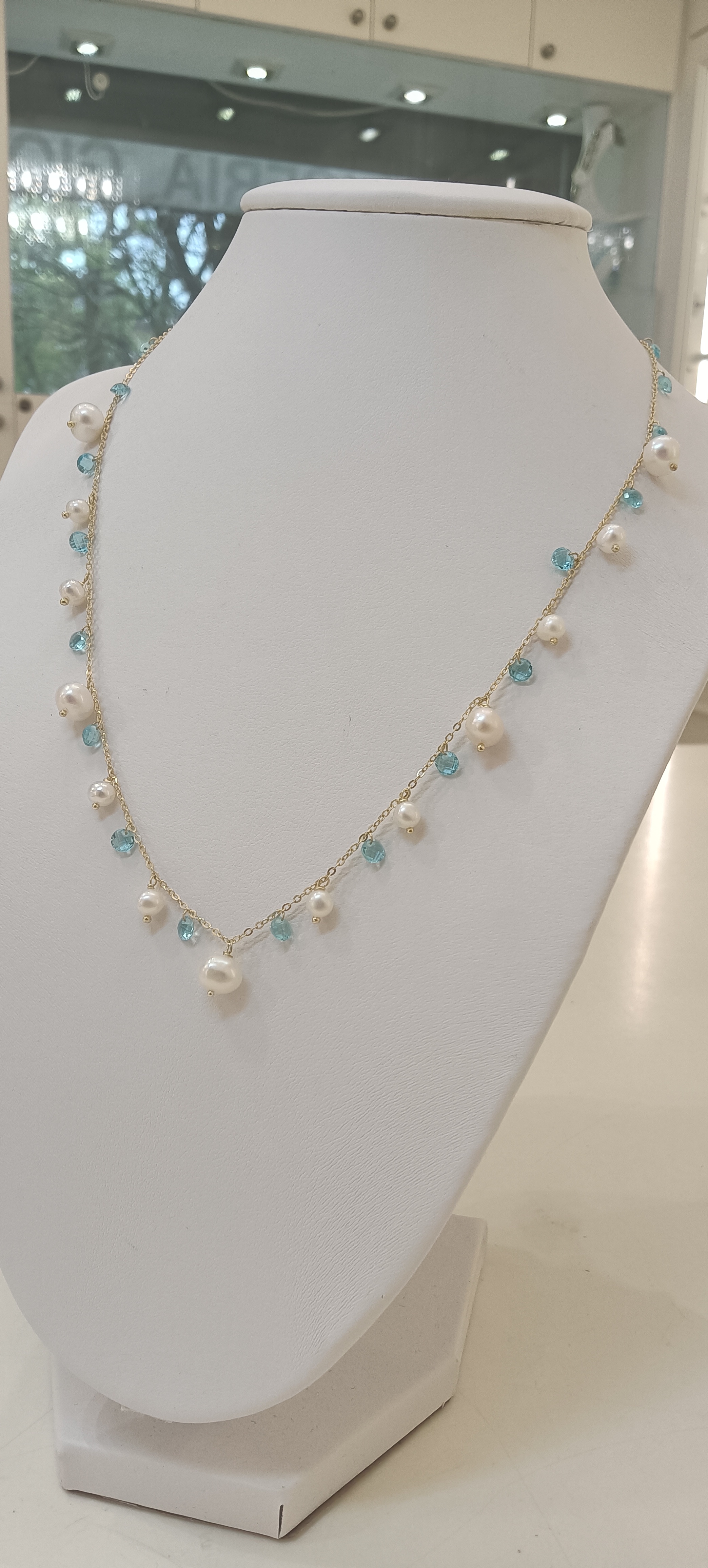 Girocollo con perle e zirconi azzurri