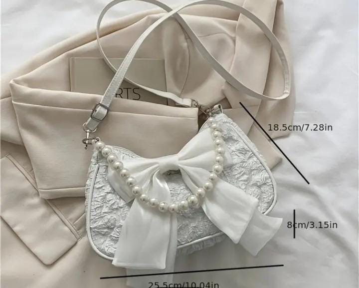 Bolso bandolera elegante con adornos de perlas