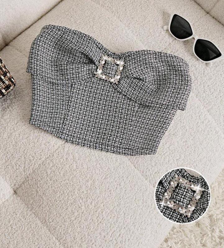 Top de tubo con broche