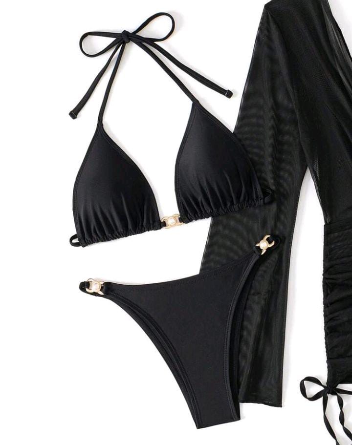 Bikini negro y vestido playero
