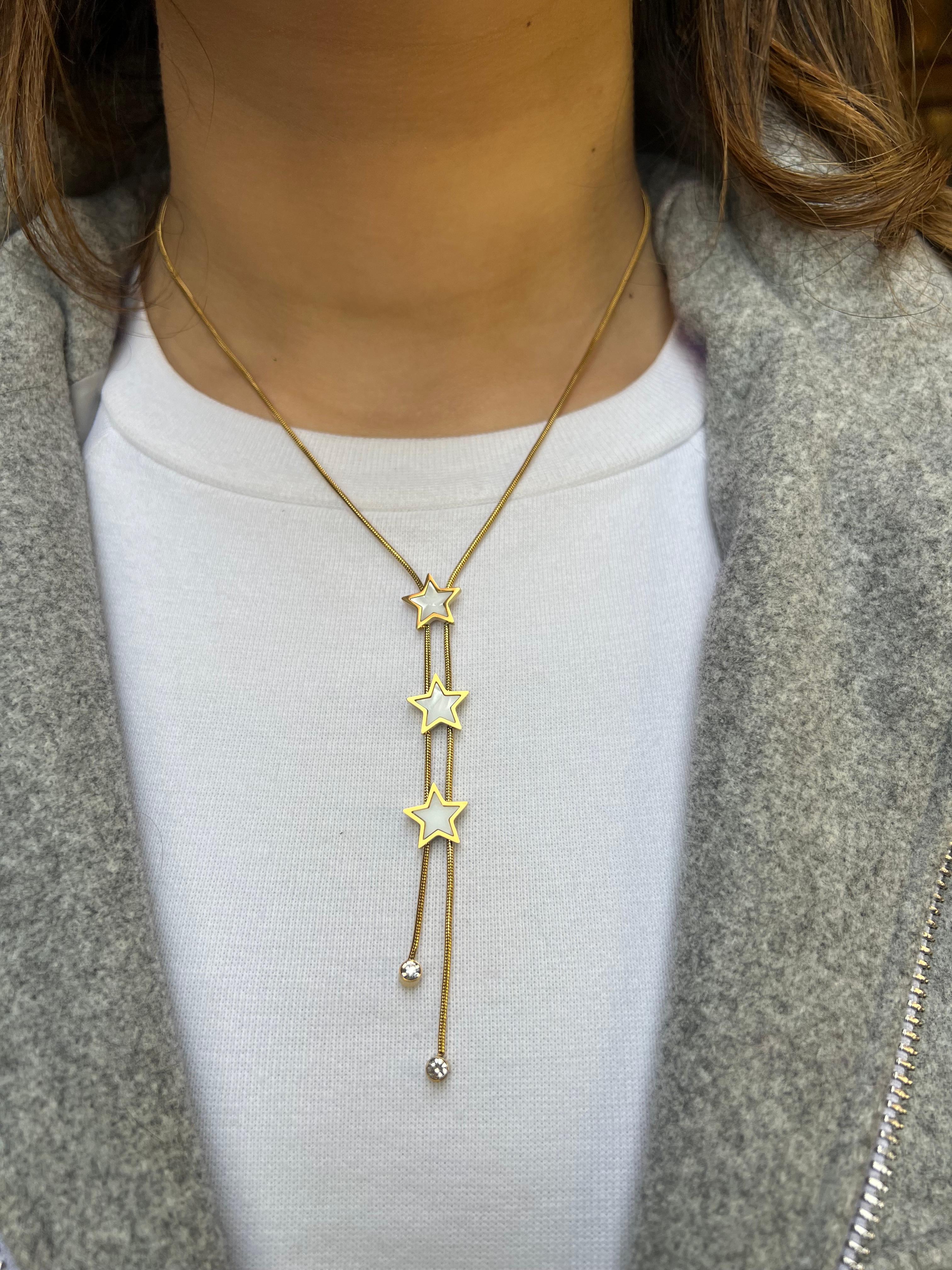 Gold star pendant 