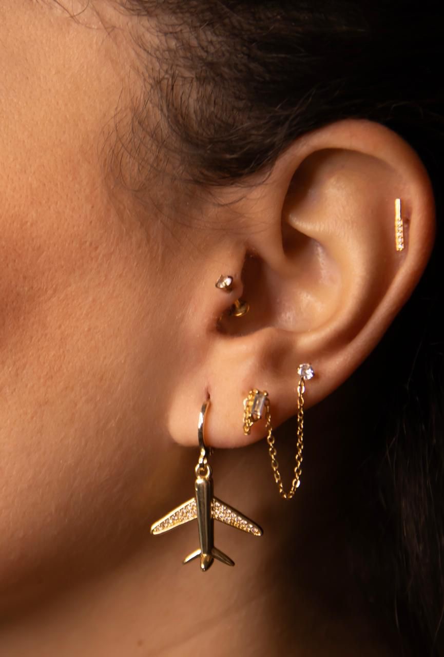 Gold airplane earrings 