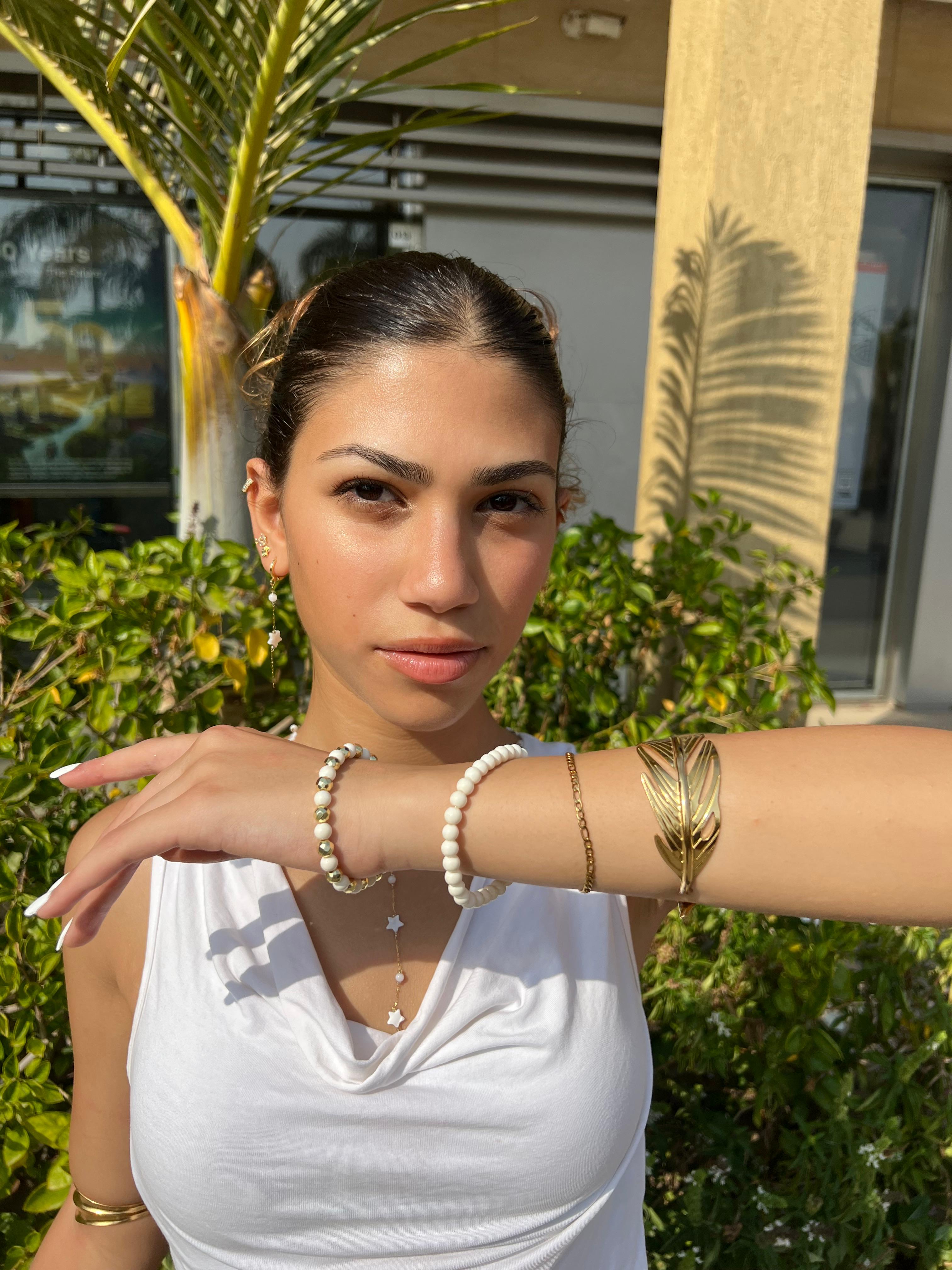 Gold and white Bracelets set