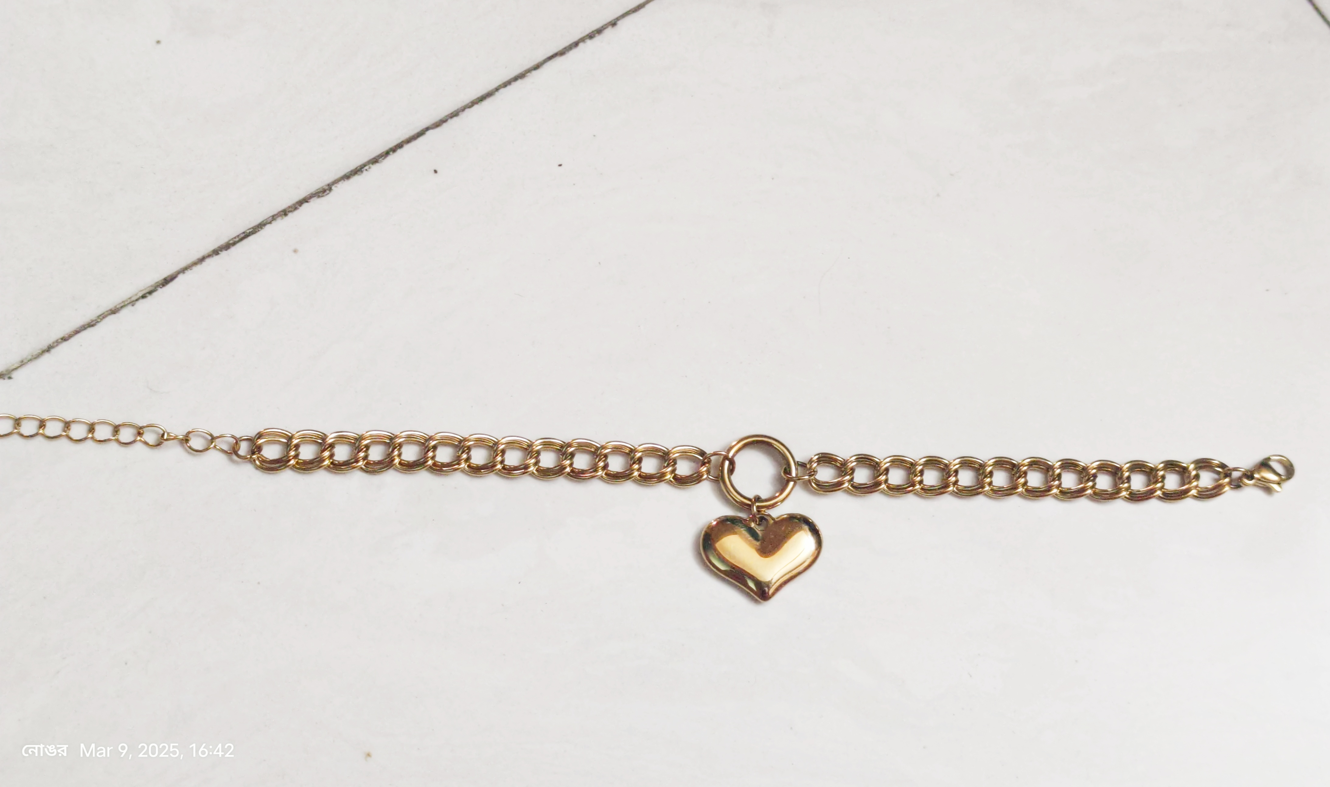 Gold Bracelet with Heart Charm