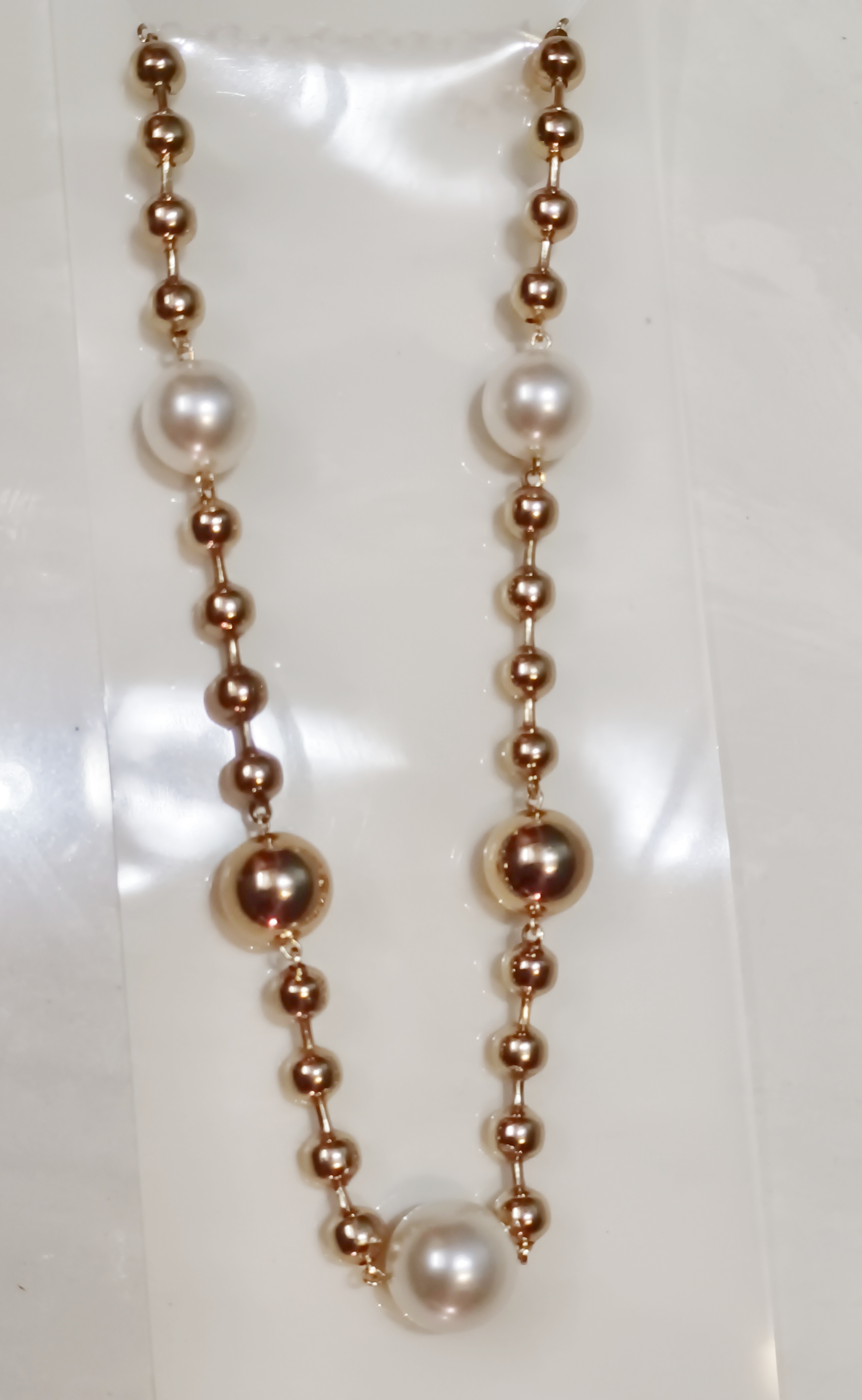 Elegant Pearl and Gold Bead Necklace