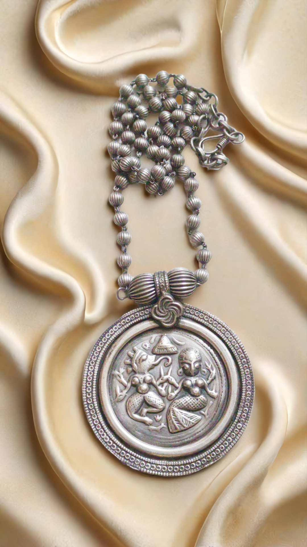 Silver Necklace with Figurative Pendant