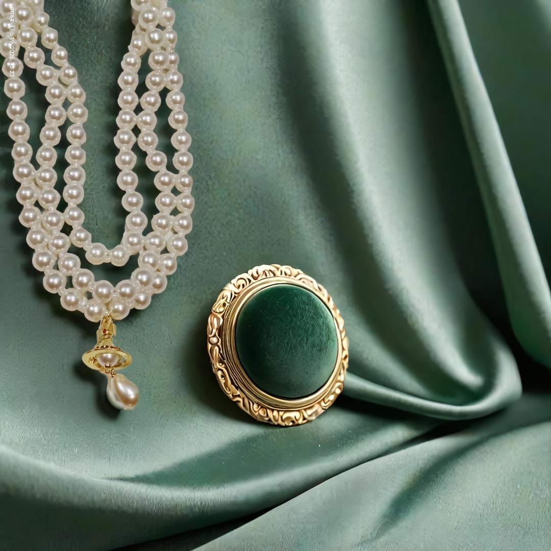 Elegant Pearl Necklace with Vintage Brooch