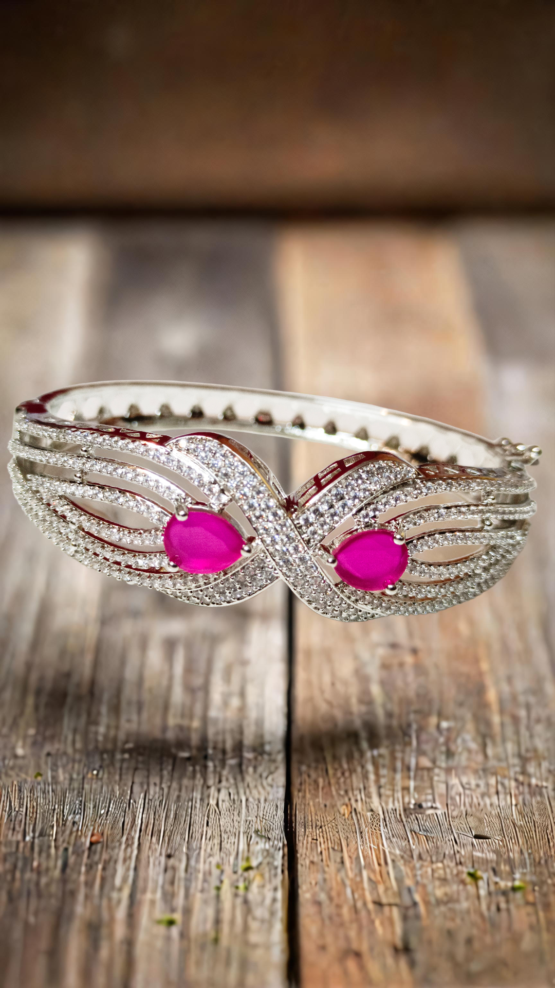 Elegant Silver Bracelet with Pink Stones