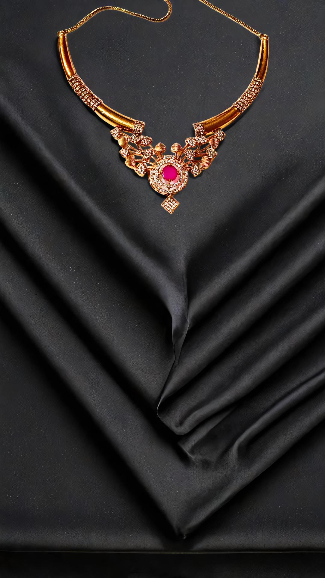 Elegant Gold Necklace with Ruby Centerpiece