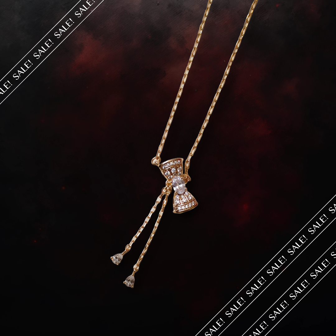 Elegant Bow Pendant Necklace,damroo with crystal and ad studed demifing chain