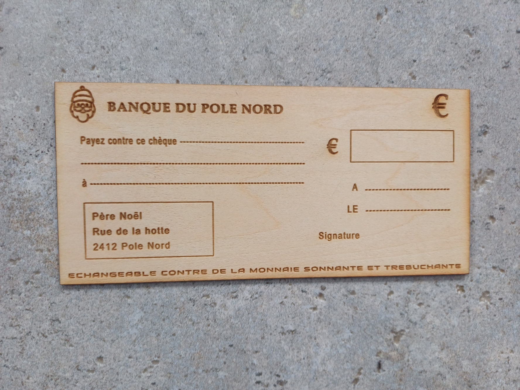 Chèque en bois du Pôle Nord
