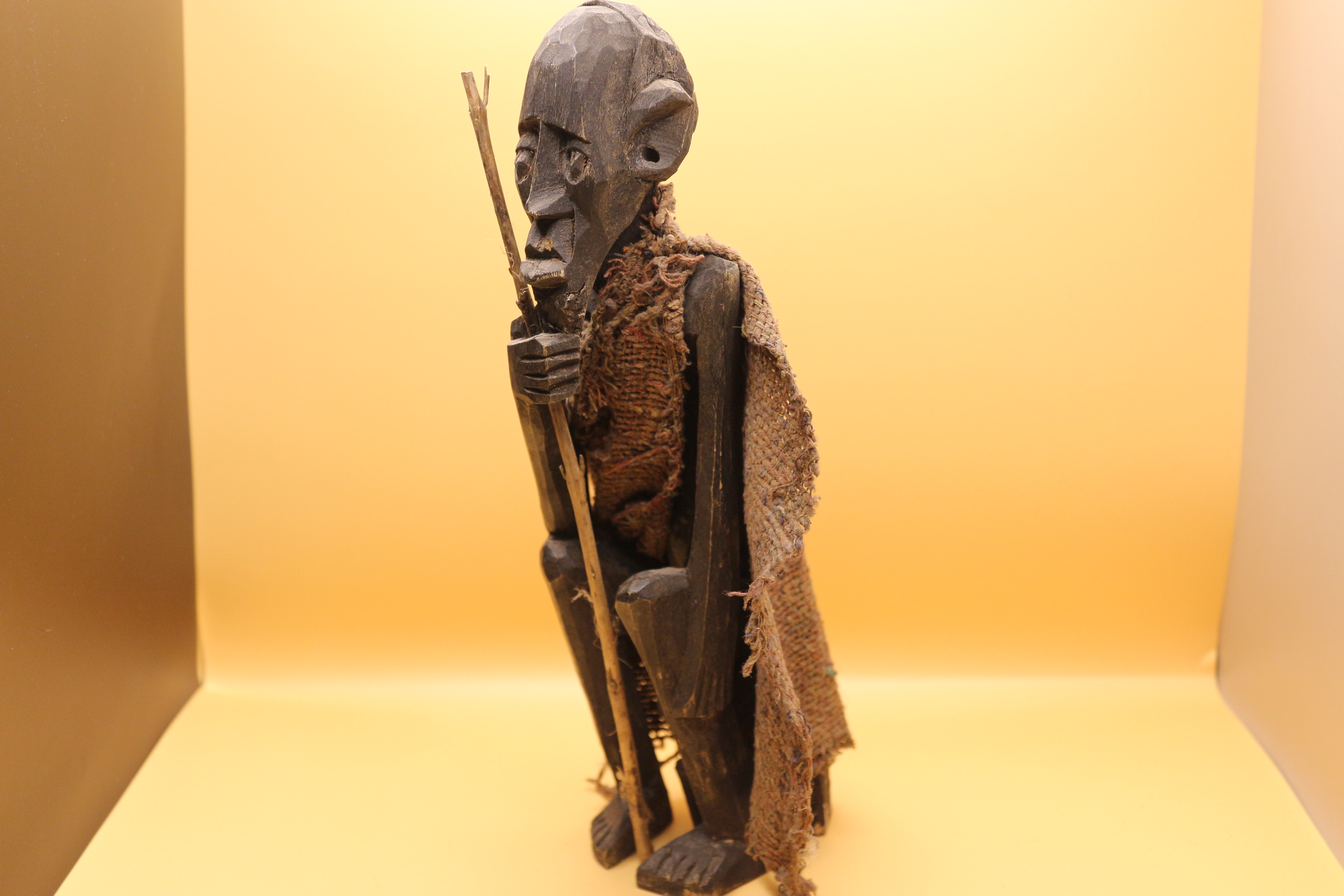 Antique African Hand Carved Wooden Man with Walking Stick.  