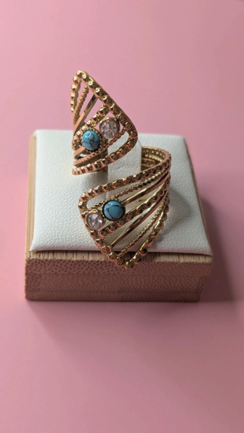 Anello regolabile dorato con pietre turchesi