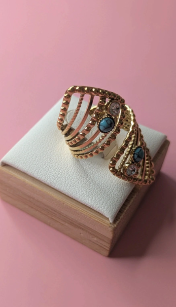 Anello regolabile dorato con pietre turchesi
