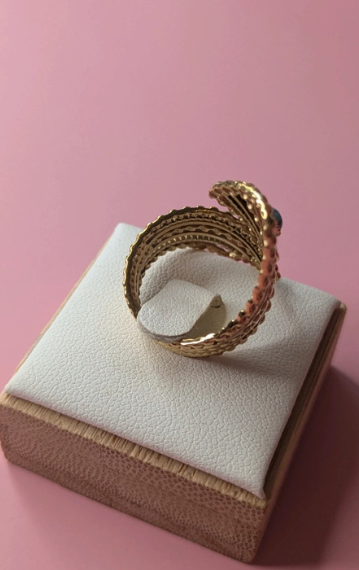 Anello regolabile dorato con pietre turchesi