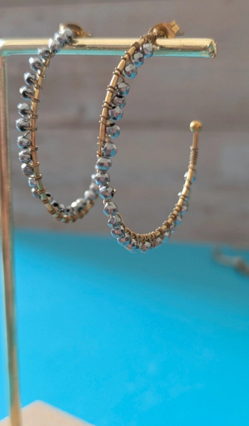 Orecchini a cerchio con perline