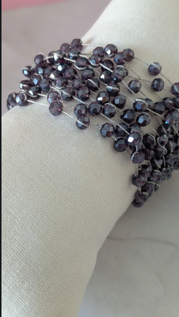 Bracciale multi-filo con perle di vetro sfaccettate