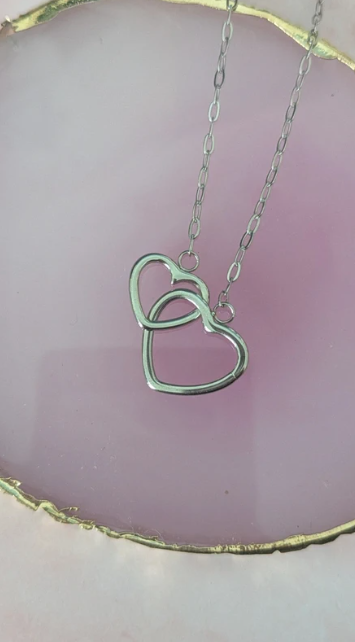 Collana girocollo con cuori intrecciati in acciaio inossidabile silver