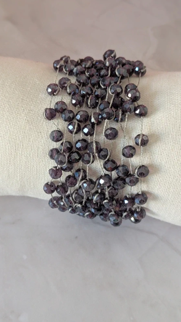 Bracciale multi-filo con perle di vetro sfaccettate