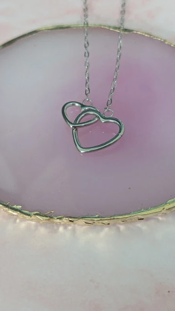 Collana girocollo con cuori intrecciati in acciaio inossidabile silver