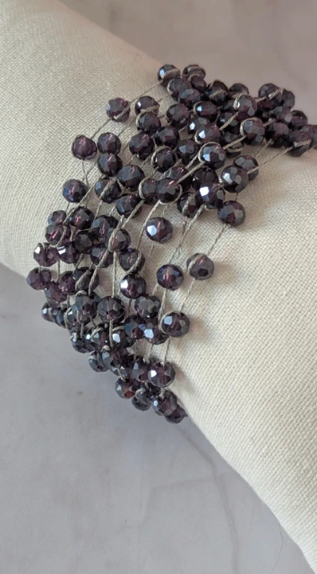 Bracciale multi-filo con perle di vetro sfaccettate